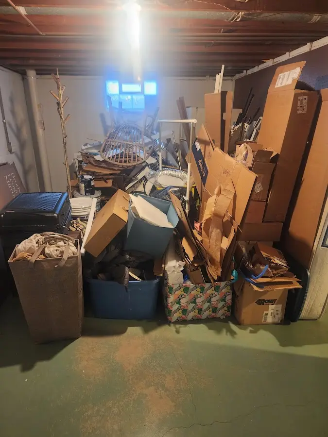 Roll-off dumpster container at job site for 15 Yard Dumpster Rental in Island Lake